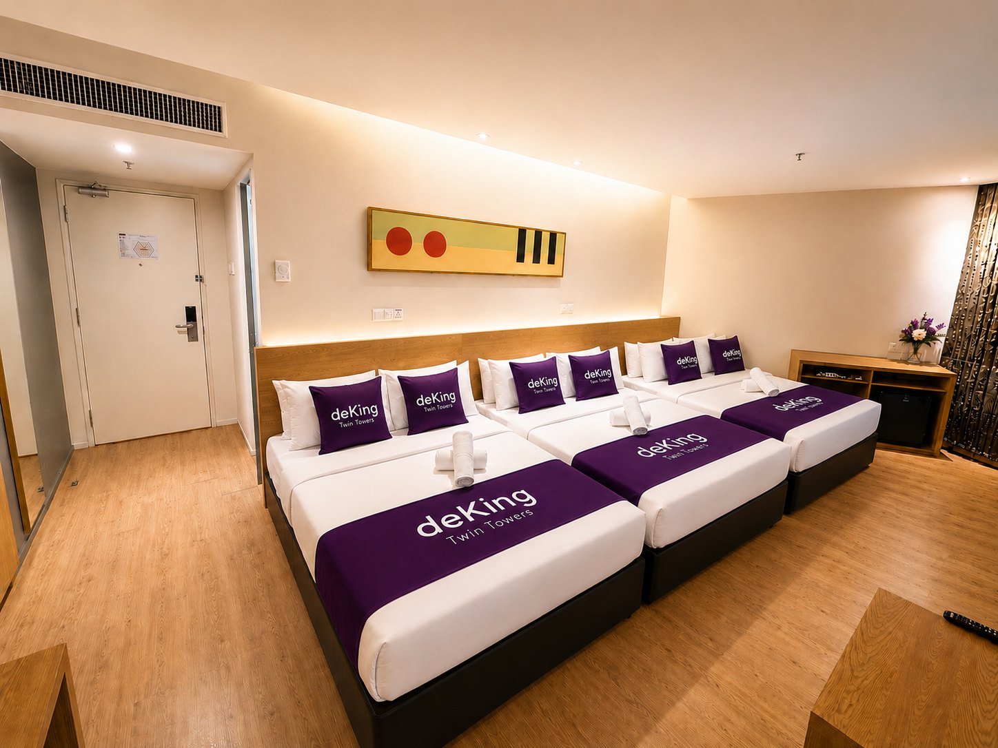 Super Family Window room at deKing Hotel KLCC with one twin bed and two queen beds