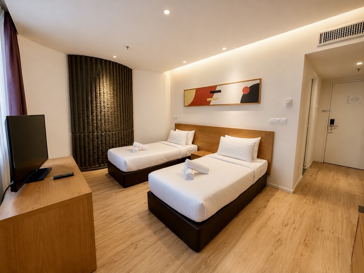 Superior Twin City View room at deKing Hotel KLCC with two twin beds